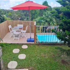 Bungalow with one bedroom in Le Gosier with wonderful mountain view shared pool enclosed garden 2 km from the beach