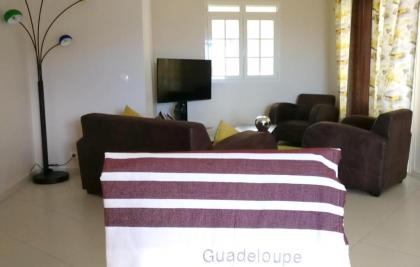 House with 3 bedrooms in Vieux Habitants with wonderful lake view furnished terrace and WiFi 40 km from the beach - image 1