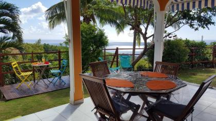 Maison de 2 chambres avec vue sur la mer jardin clos et wifi a Vieux Habitants a 2 km de la plage - image 1