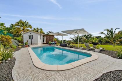 Bungalow d'une chambre avec piscine partagee jardin clos et wifi a Petit Bourg - image 1