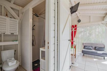 Bungalow d'une chambre avec piscine partagee jardin clos et wifi a Petit Bourg - image 19