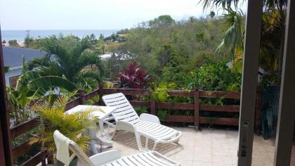 Studio avec vue sur la mer jardin clos et wifi a Marigot a 1 km de la plage - image 1