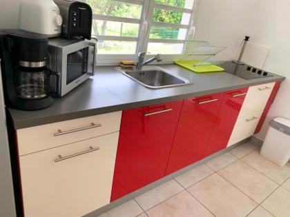 Appartement d'une chambre avec piscine partagee jardin clos et wifi a Le Gosier a 2 km de la plage - image 1
