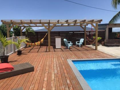Villa de 3 chambres avec vue sur la mer piscine privee et terrasse amenagee a Le Gosier a 4 km de la plage - image 1