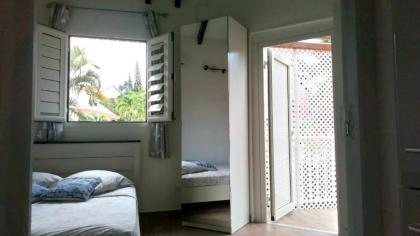 Bungalow d'une chambre avec piscine partagee jardin clos et wifi a Le Gosier - image 11