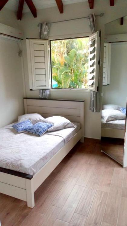 Bungalow d'une chambre avec piscine partagee jardin clos et wifi a Le Gosier - image 8