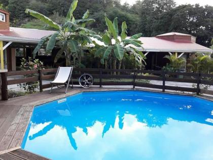 Bungalow de 2 chambres avec piscine partagee jacuzzi et terrasse amenagee a Le Gosier a 5 km de la plage - image 10