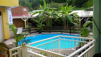 Bungalow de 2 chambres avec piscine partagee jacuzzi et terrasse amenagee a Le Gosier a 5 km de la plage - image 8