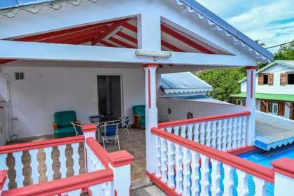 Maison de 2 chambres avec vue sur la mer terrasse amenagee et wifi a Vieux Habitants a 1 km de la plage - image 10