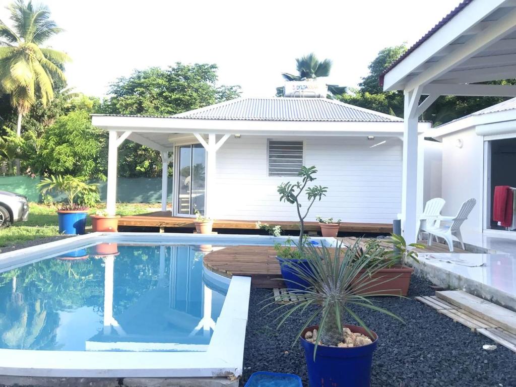 Villa with 2 bedrooms in Le Moule with wonderful sea view private pool enclosed garden - main image