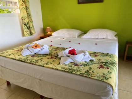 Bungalow de 2 chambres avec vue sur la mer piscine partagee et jardin clos a Vieux Habitants a 6 km de la plage - image 16