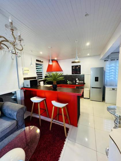 Maison d'une chambre avec piscine partagee terrasse amenagee et wifi a Sainte Rose a 5 km de la plage - image 11