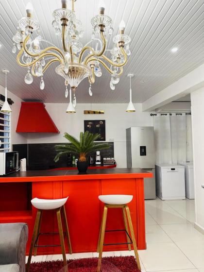 Maison d'une chambre avec piscine partagee terrasse amenagee et wifi a Sainte Rose a 5 km de la plage - image 24